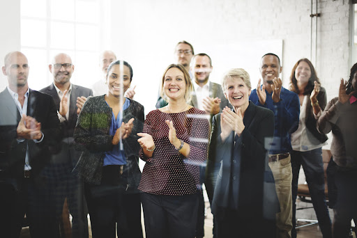 Business People Team Applauding Achievement Concept