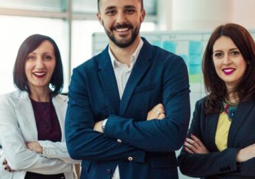 team members smiling